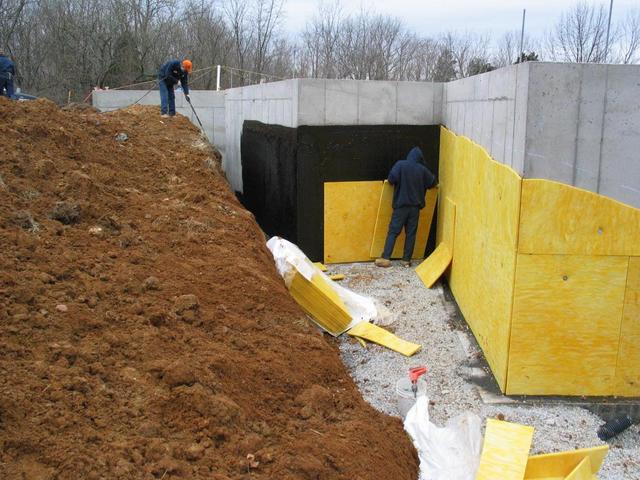 Hot tar and fiberglass