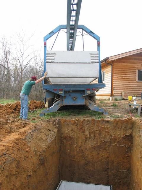 12 foot hole, with 4 inches of sand.